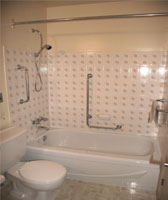 Bathroom With Safety Grab Bars image